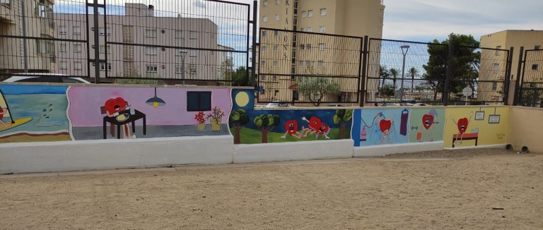 Un fragment del mural pintat a l'Escola Mestral