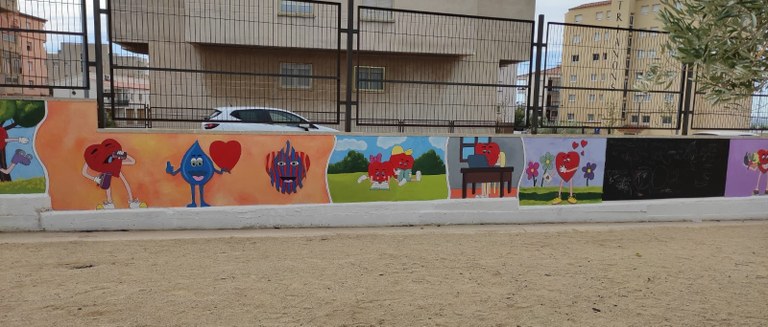 Un fragment del mural pintat a l'Escola Mestral